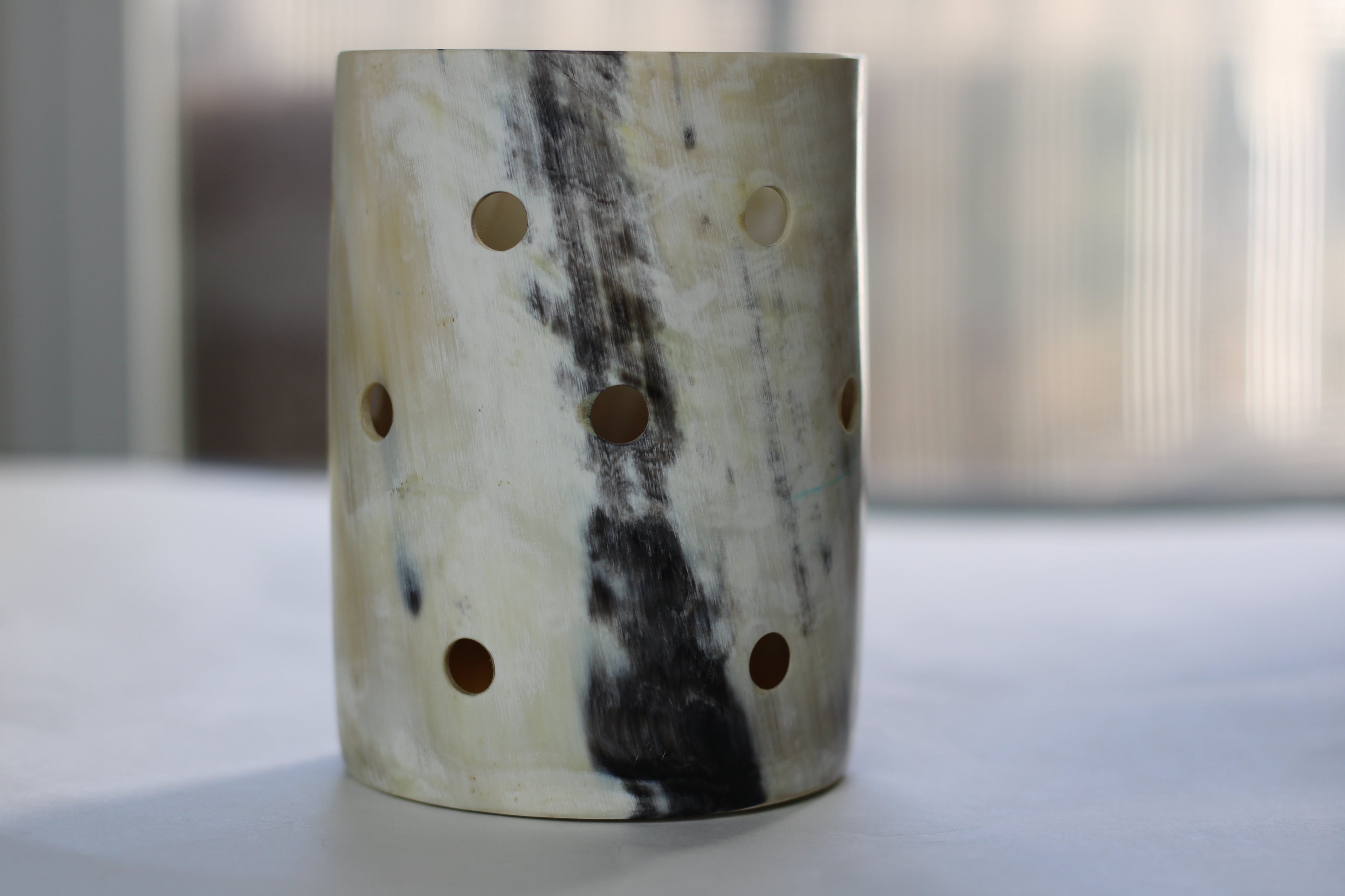 Cow Horn Column™ – Handcrafted Ugandan Horn Holder