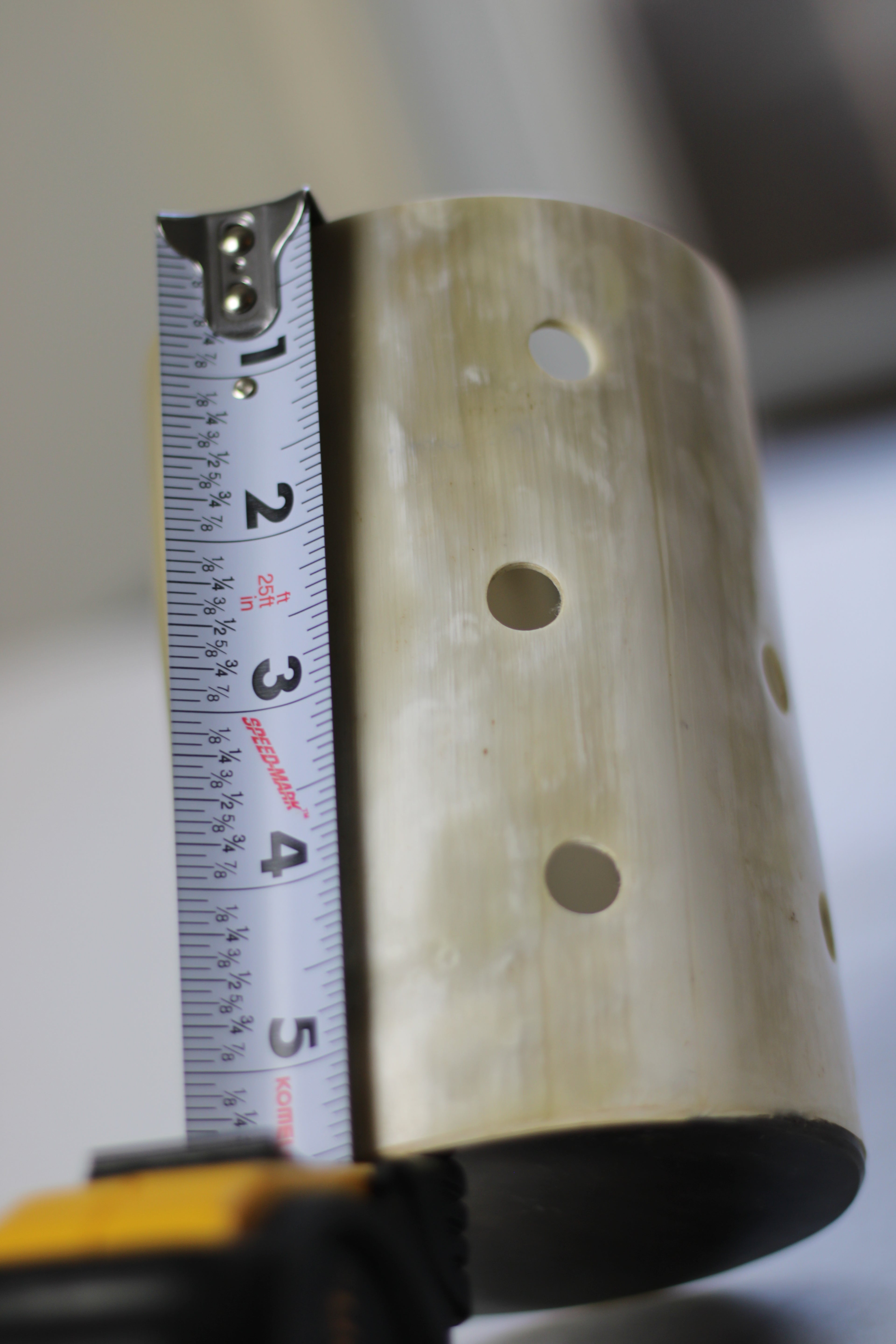 Cow Horn Column™ – Handcrafted Ugandan Horn Holder